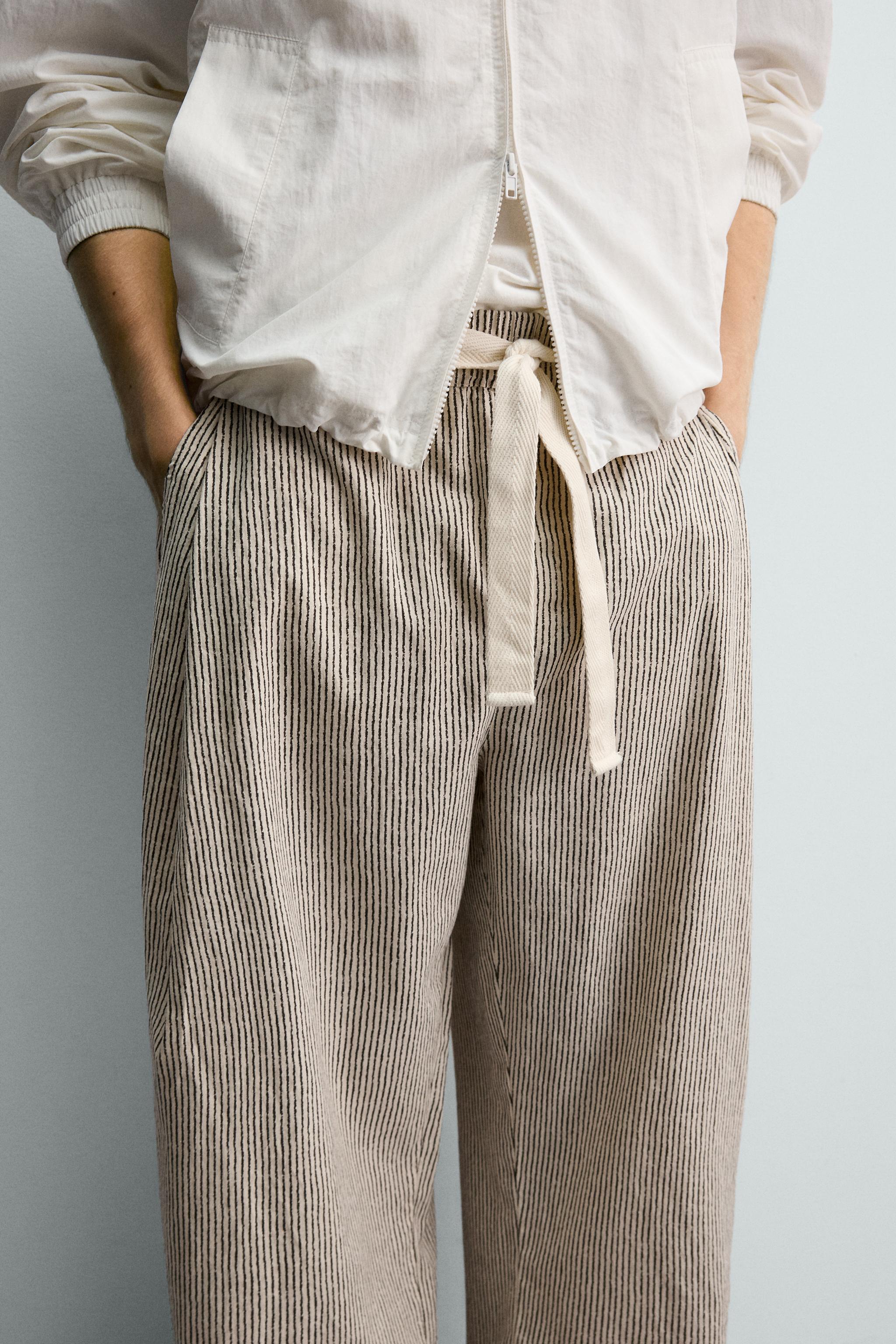 STRIPED WIDE FIT BELTED PANTS